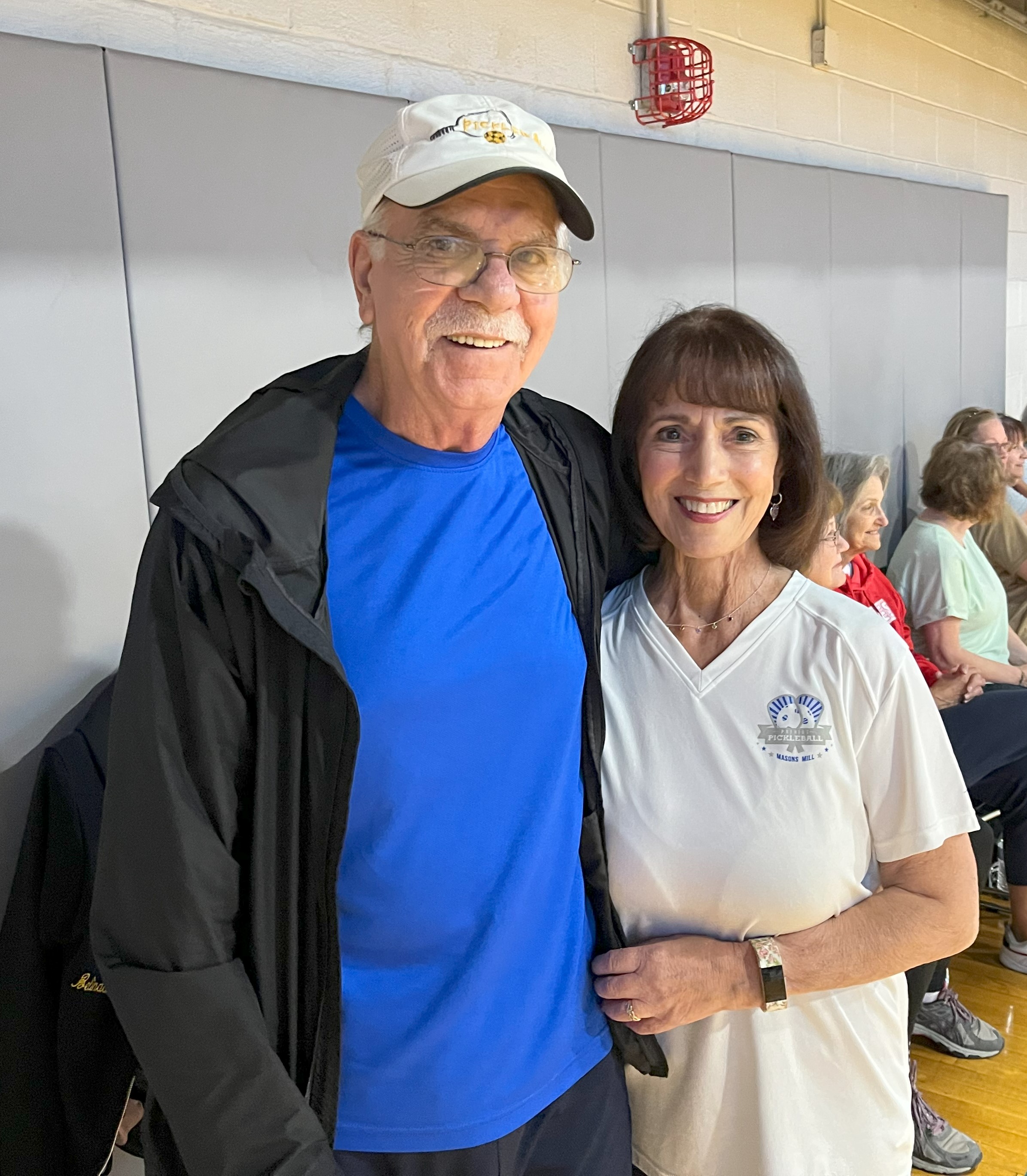 couples playing pickleball