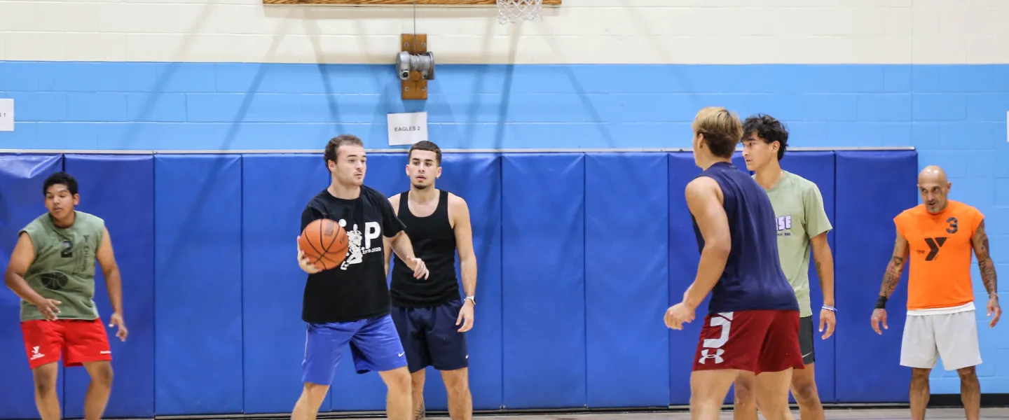 men playing basketball