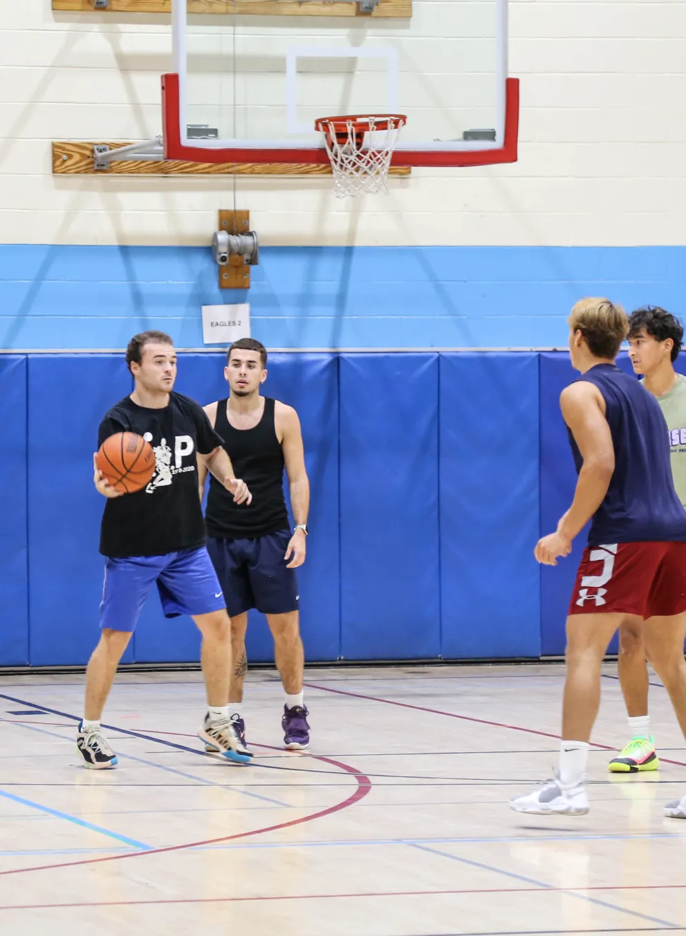 men playing basketball