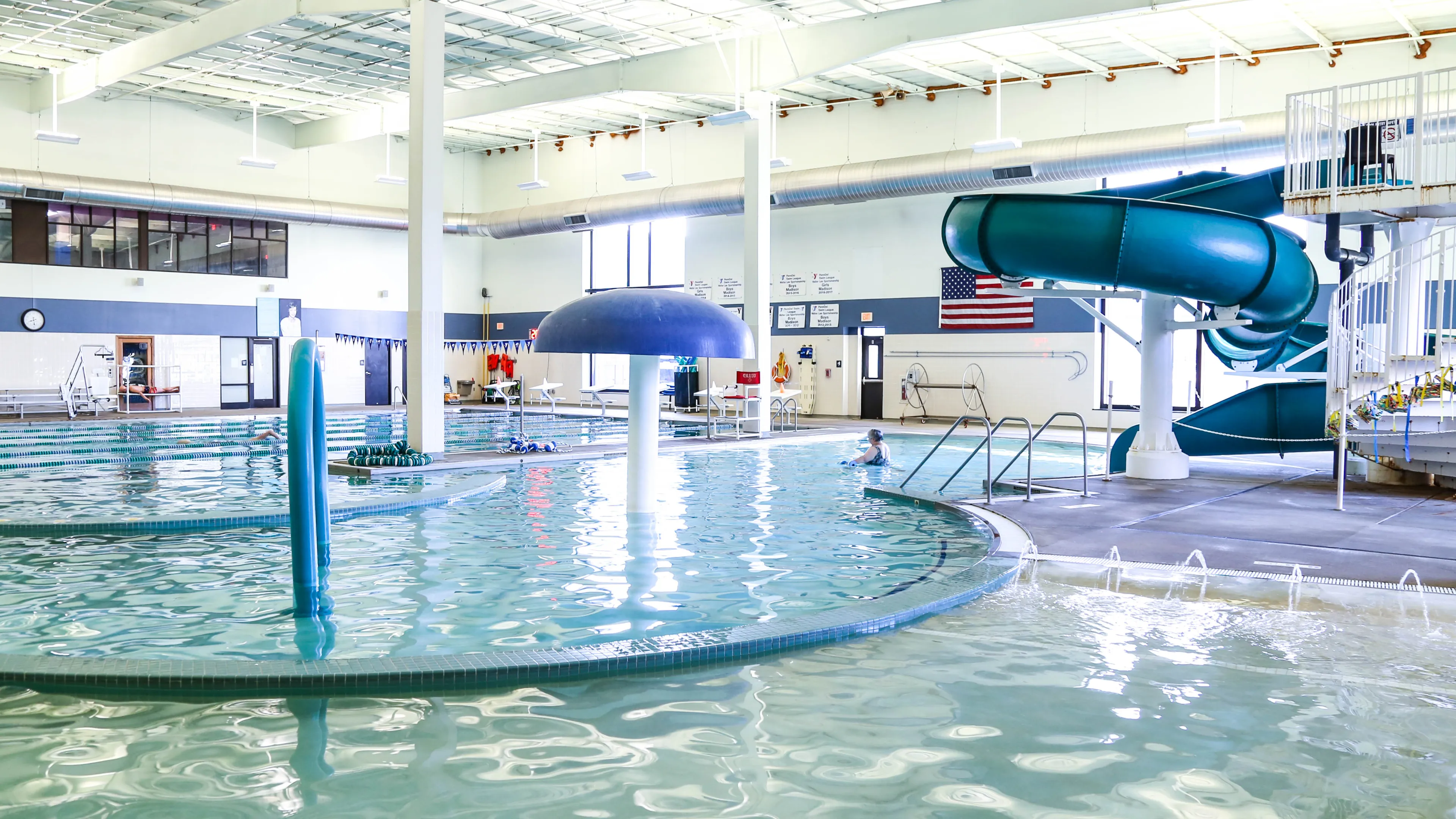 pool with water slide and play elements