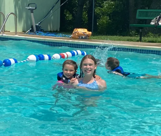 girls swimming in holland pool