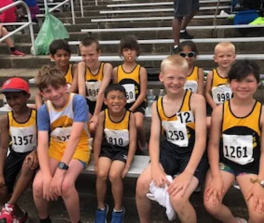 track team sitting on bench