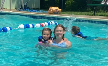 girls swimming in holland pool