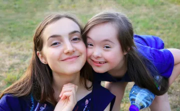 camper with counselor